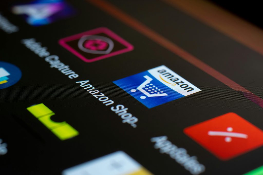 Home Close-up of the Amazon shopping app icon on a smartphone screen. Ideal for online shopping and technology themes.